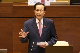 Bộ trưởng Bộ Lao động-Thương binh và Xã hội Đào Ngọc Dung trả lời chất vấn. (Ảnh: Doãn Tấn/TTXVN)
