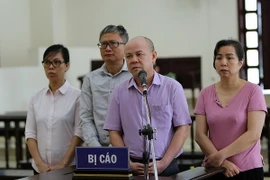 Các bị cáo nghe quan điểm luận tội của đại diện Viện Kiểm sát tại phiên tòa phúc thẩm. (Ảnh: Dương Giang/TTXVN)