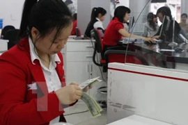 Tiền lương cao nhưng nhiều quản lý, giám đốc các công ty vẫn chưa hài lòng. (Ảnh minh họa: TTXVN)