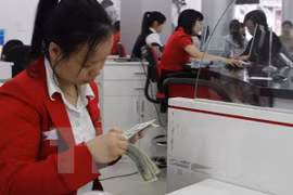 Tiền lương cao nhưng nhiều quản lý, giám đốc các công ty vẫn chưa hài lòng. (Ảnh minh họa: TTXVN)