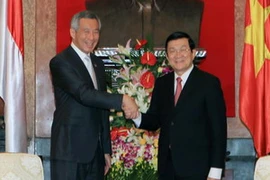 Chủ tịch nước Trương Tấn Sang tiếp Thủ tướng Singapore Lý Hiển Long. (Ảnh: Nguyễn Khang/TTXVN)