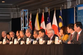 Bộ trưởng Thương mại các nước tham gia đàm phán TPP trong cuộc họp báo thông báo về thỏa thuận TPP tại hội nghị ở Atlanta ngày 5/10. (Nguồn: THX/TTXVN)