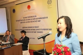 Thứ trưởng Bộ Lao động-Thương binh và Xã hội Đào Hồng Lan phát biểu tại Hội nghị. (Ảnh: Anh Tuấn/TTXVN)