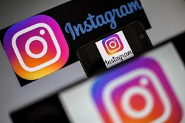 Biểu tượng ứng dụng Instagram trên màn hình điện thoại di động. (Ảnh: AFP/TTXVN)