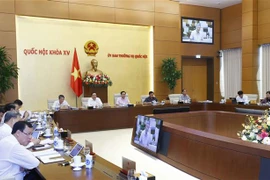 UBTV Quốc hội thông qua dự án Pháp lệnh Xử phạt vi phạm hành chính đối với hành vi cản trở hoạt động tố tụng. (Ảnh: Doãn Tuấn/TTXVN)