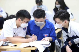 Thí sinh đăng ký dự thi tốt nghiệp THPT 2022. (Ảnh: Thanh Tùng/TTXVN)