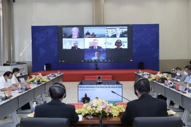 Diễn đàn Hội nghị trực tuyến xúc tiến đầu tư Công hòa Liên Bang Đức với chủ đề “Hậu Covid – Doanh nghiệp trong trạng thái Bình thường mới – Tiềm năng đầu tư và kinh doanh tại tỉnh Bình Dương”. (Ảnh: Chí Tưởng/TTXVN)