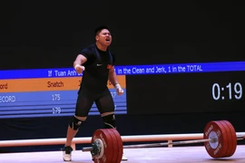 Niềm vui của VĐV BùiTuấn Anh khi hoàn thành phần thi. (Ảnh: Huy Hùng/TTXVN)