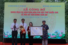 Lễ công bố di sản phi vật thể quốc gia “Lễ hội Kỳ yên Đình Tân An”. (Ảnh: Chí Tưởng/TTXVN)