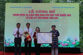 Lễ công bố di sản phi vật thể quốc gia “Lễ hội Kỳ yên Đình Tân An”. (Ảnh: Chí Tưởng/TTXVN)