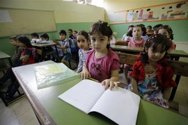 Học sinh tại một trường học ở Tripoli, Libya. (Ảnh: AFP/TTXVN)