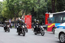Công an Hà Nội ra quân bảo đảm an ninh, trật tự cho SEA Games 31. (Ảnh: Phạm Kiên/TTXVN)