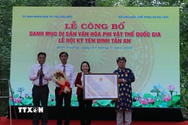 Lễ công bố di sản phi vật thể quốc gia “Lễ hội Kỳ yên Đình Tân An”. (Ảnh: Chí Tưởng/TTXVN)