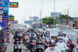 [Photo] Người dân đổ về TP Hồ Chí Minh sau kỳ nghỉ Tết Nguyên đán