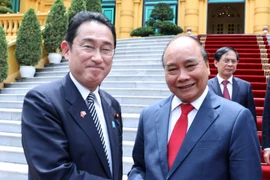 Chủ tịch nước Nguyễn Xuân Phúc tiếp Thủ tướng Nhật Bản Kishida Fumio. (Ảnh: Thống Nhất/TTXVN)