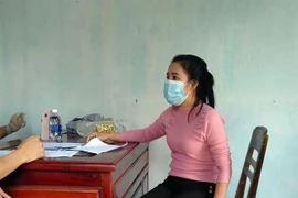 Đối tượng Nang Xi Sup La cùng tang vật. (Ảnh: TTXVN phát)