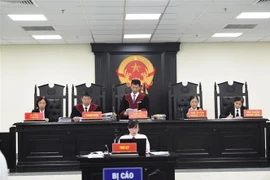 Hội đồng xét xử tại phiên tòa. (Ảnh: Kim Anh/TTXVN)