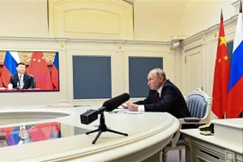 Tổng thống Nga Vladimir Putin tại cuộc họp trực tuyến với Chủ tịch Trung Quốc Tập Cận Bình ngày 28/6/2021. (Ảnh: AFP/TTXVN)