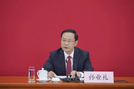 Ông Tôn Nghiệp Lễ, phát ngôn viên Đại hội Đại biểu Toàn quốc lần thứ XX của Đảng Cộng sản Trung Quốc, trong cuộc họp báo về đại hội ở Bắc Kinh, ngày 15/10/2022. (Ảnh: THX/TTXVN)