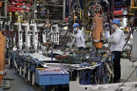 Sản xuất xe ôtô tại nhà máy Ford Hải Dương. (Ảnh: Trần Việt/TTXVN)