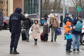 Người tị nạn Ukraine sơ tán tới Palanca,Moldova, ngày 2/3/2022. (Ảnh: THX/TTXVN)