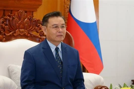 Chủ tịch Quốc hội Lào Xaysomphone Phomvihane trả lời phỏng vấn phóng viên TTXVN tại Lào về quan hệ hợp tác giữa hai Quốc hội. (Ảnh: Phạm Kiên/TTXVN)