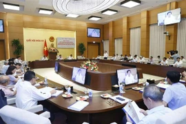 Chủ tịch Quốc hội Vương Đình Huệ dự Hội thảo góp ý Dự thảo Luật đất đai (sửa đổi) ngày 26/8. (Ảnh: Doãn Tuấn/TTXVN)