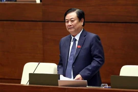 Bộ trưởng Nông nghiệp và Phát triển nông thôn Lê Minh Hoan trả lời phiên chất vấn. (Ảnh: Phạm Kiên/TTXVN)