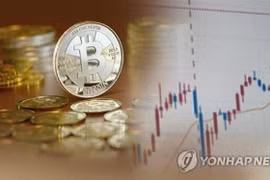  Đồng tiền điện tử Bitcoin. (Ảnh: YONHAP/TTXVN)