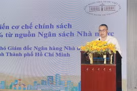 Ông Nguyễn Đức Lệnh, Phó giám đốc Ngân hàng Nhà nước Việt Nam Chi nhánh TP. Hồ Chí Minh cập nhật việc triển khai Nghị định 31/2022/NĐ-CP. (Ảnh: Mỹ Phương/TTXVN)