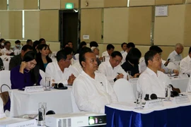 Đại biểu các tỉnh thành phố phía Nam tham dự hội thảo tổng kết 10 năm thực hiện Nghị quyết hội nghị Trung ương 5 khóa XI. (Ảnh: Thanh Vũ/TTXVN)