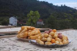 [Photo] Pẻng Khua - quà quê ngày Tết của người Nùng Cao Bằng