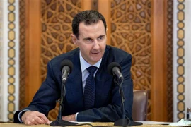 Tổng thống Syria Bashar al-Assad phát biểu trong một cuộc họp tại Damascus. (Ảnh: AFP/TTXVN)