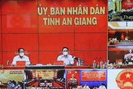 Thủ tướng Chính phủ Phạm Minh Chính chỉ đạo công tác phòng, chống dịch COVID-19 với các tỉnh biên giới phía Tây Nam. (Ảnh: Văn Điệp/TTXVN)