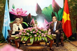 Bí thư Thành ủy Thành phố Hồ Chí Minh Nguyễn Thiện Nhân tiếp bà Irana Bokova, Tổng Giám đốc Tổ chức Giáo dục, Khoa học và Văn hóa của Liên hợp quốc (UNESCO) đang thăm chính thức Việt Nam. (Ảnh: Thanh Vũ/TTXVN)