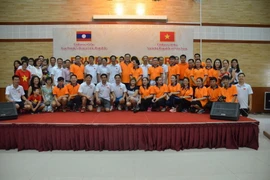Các cán bộ tham gia buổi giao lưu. (Ảnh: Nguyễn Lâm/Vietnam+)
