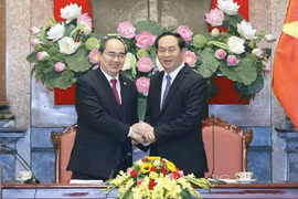 Chủ tịch nước Trần Đại Quang và Chủ tịch Ủy ban Trung ương Mặt trận Tổ quốc Việt Nam Nguyễn Thiện Nhân tại Hội nghị. (Ảnh: Nhan Sáng/TTXVN)