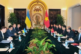 Phó Thủ tướng, Bộ trưởng Ngoại giao Phạm Bình Minh đón và hội đàm với Bộ trưởng Ngoại giao Ukraine Pavlo Klimkin. (Ảnh: Nguyễn Khang/TTXVN)