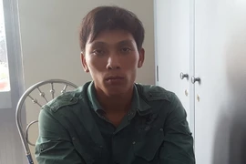 Đối tượng Nguyễn Út Lọt tại cơ quan công an. (Ảnh: Huỳnh Thế Anh/TTXVN)