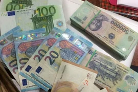 Tài sản bỏ quên của khách hàng Micheal. (Ảnh: Lê Lâm/Vietnam+)