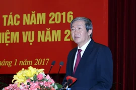 Ông Đinh Thế Huynh phát biểu. (Ảnh: Nguyễn Dân/TTXVN)