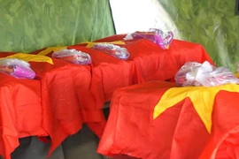 Hài cốt các liệt sỹ.(Ảnh: Huyền Trang/TTXVN)