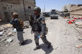 Lực lượng Iraq tuần tra tại Mosul ngày 17/6. (Nguồn: AFP/TTXVN)