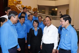 Thủ tướng Nguyễn Xuân Phúc với các đại biểu. (Ảnh: Thống Nhất/TTXVN)