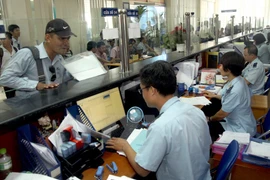 Làm thủ tục hải quan. (Nguồn: TTXVN)