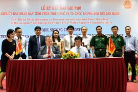 Quang cảnh buổi lễ ký kết. (Ảnh: Quốc Việt/TTXVN)