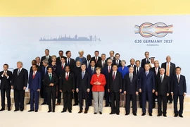 Thủ tướng Nguyễn Xuân Phúc và các trưởng đoàn tham dự hội nghị. (Ảnh: Thống Nhất/TTXVN)