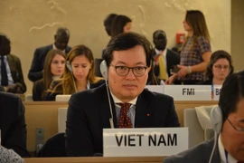 Đại sứ đặc mệnh toàn quyền Dương Chí Dũng, Trưởng Phái đoàn thường trực Việt Nam tại Liên hợp quốc tham dự một kỳ họp của Hội đồng Nhân quyền. (Ảnh: Hoàng Hoa/TTXVN)