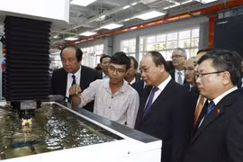 Thủ tướng Nguyễn Xuân Phúc đến thăm và làm việc với Trường Đại học Việt Đức. (Ảnh: Thống Nhất/TTXVN)