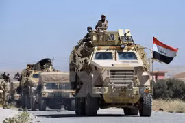 Lực lượng Chính phủ Iraq tiến vào giải phóng Tal Afar khỏi tổ chức khủng bố IS ngày 9/6. (Nguồn: AFP/TTXVN) 